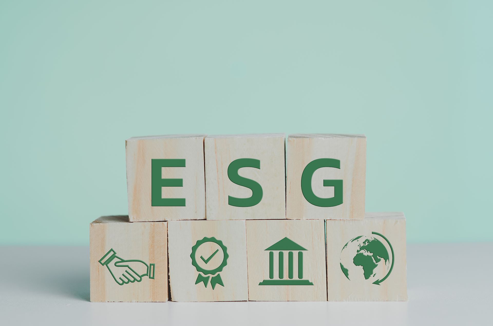 wooden cubes with ESG Environmental Social Governance symbol on
